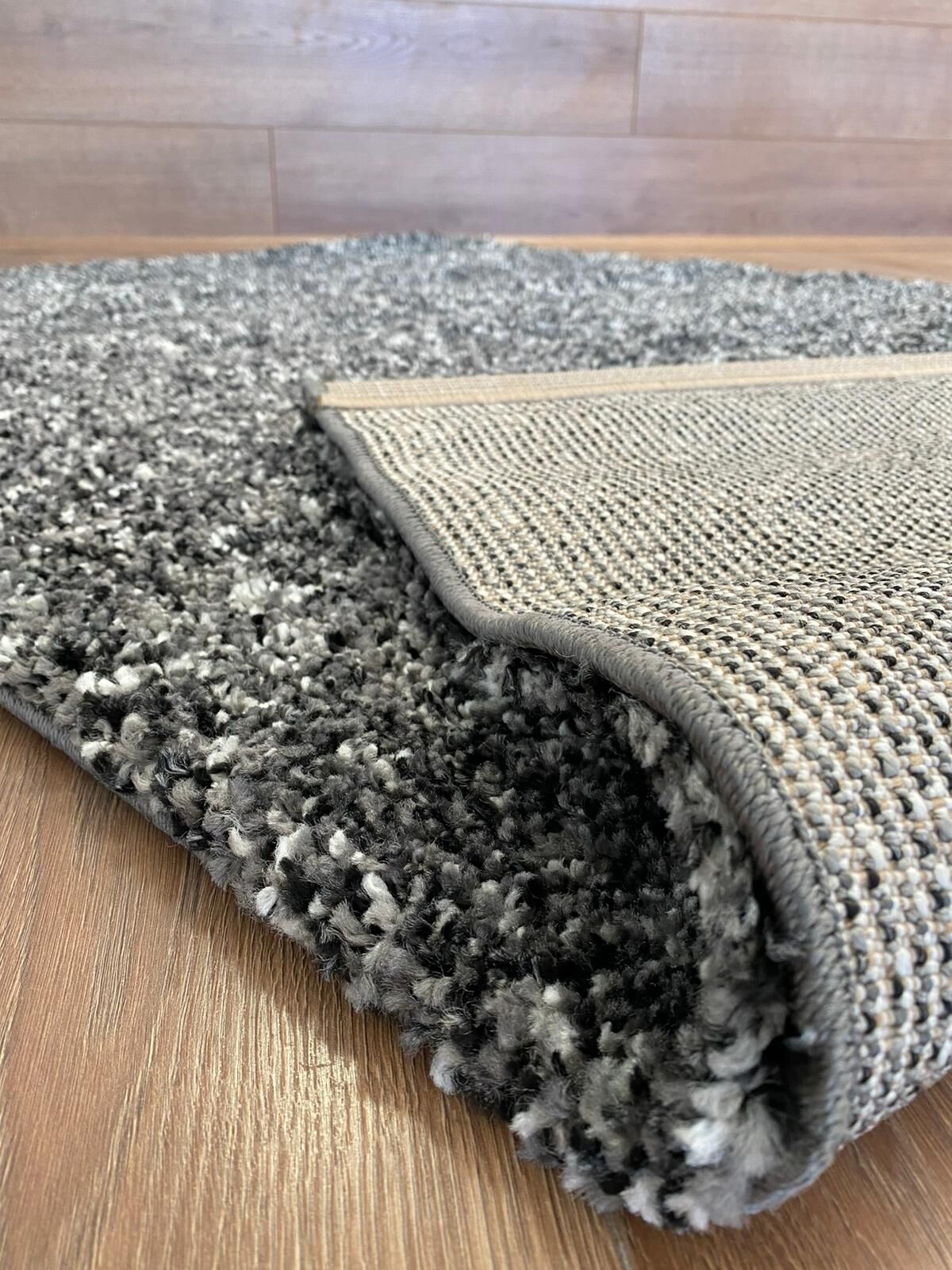 Dark grey carpet folded